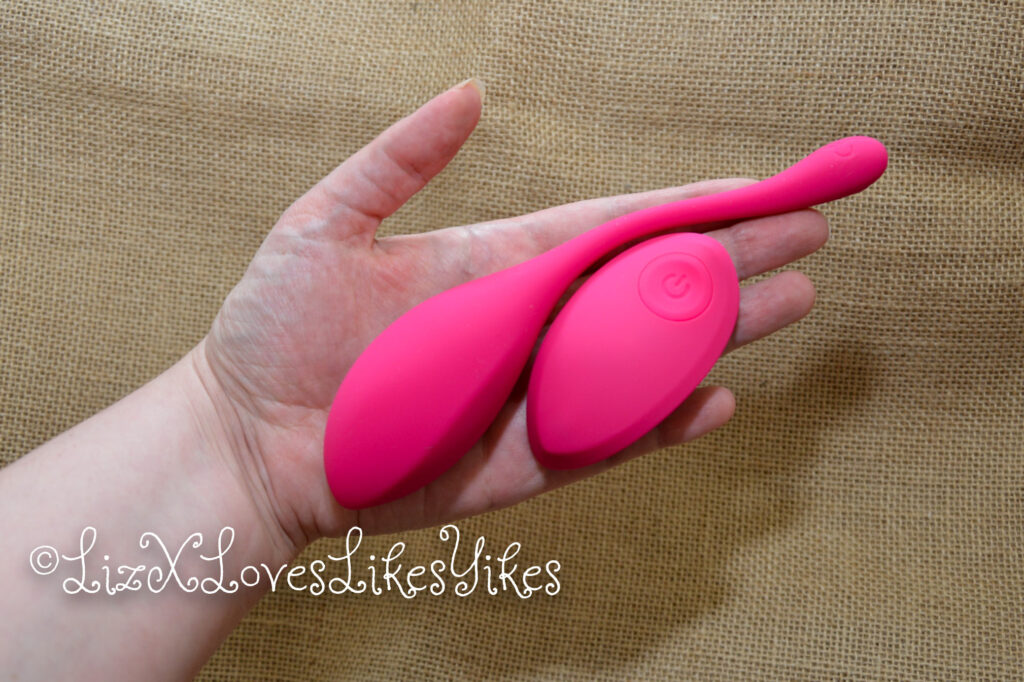 BestVibe Review Silky-Smooth Silicone Head Vibrating Egg With Remote Control Picture with vibrator in hand