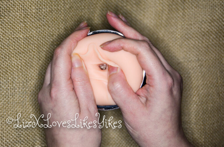 BestVibe Review of Vibrating Double Labia Male Masturbator The full masturbator is shown here in Liz' hands Copyright Liz BlackX