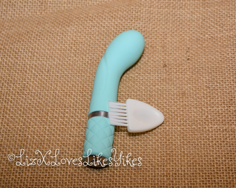 The vibrator and its brush Review of Pillow Talk Racy G-spot Vibrator - Teal Copyright Liz BlackX