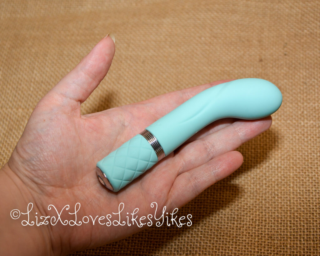 The vibrator in Liz's hand Review of Pillow Talk Racy G-spot Vibrator - Teal Copyright Liz BlackX