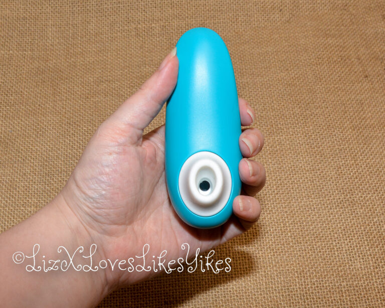 The Womanizer from the other side in my hand. Review of the Womanizer Starlet 3 Pleasure Air Clitoral Stimulator Copyright Liz BlackX