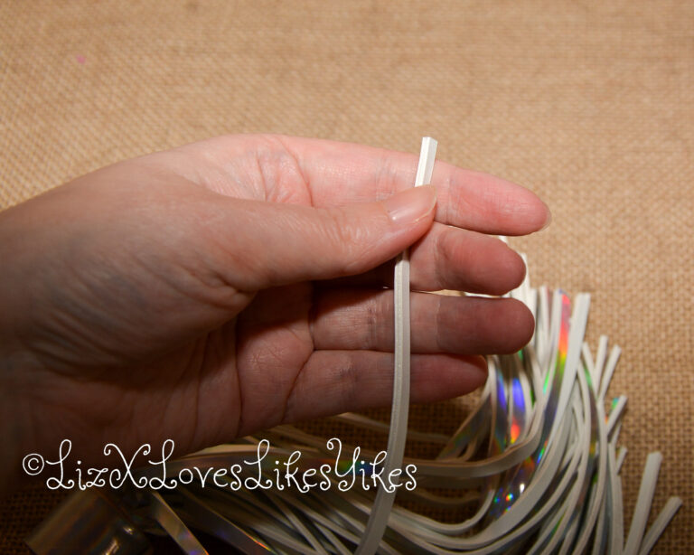 Review of the Cosmo Bondage Holographic Flogger Copyright Liz BlackX