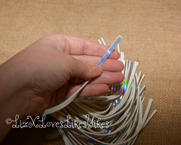 Review of the Cosmo Bondage Holographic Flogger Copyright Liz BlackX