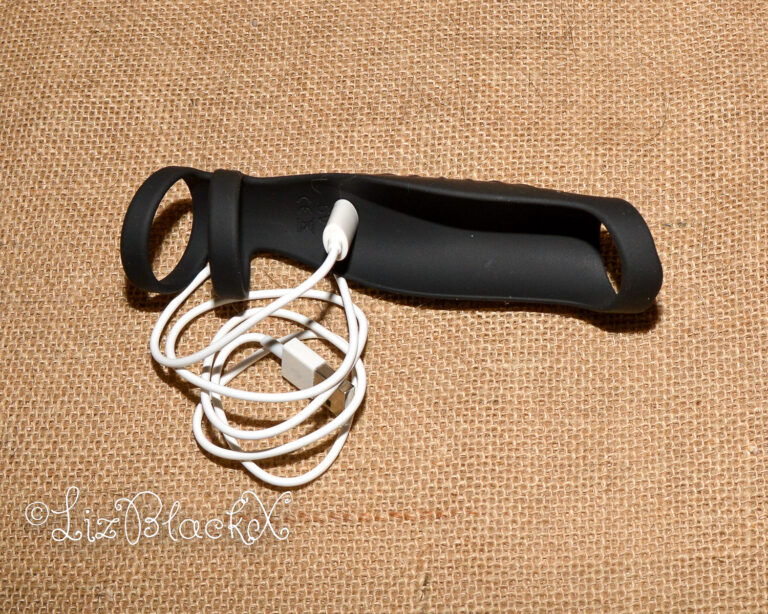 Review of The Rocketeer Vibrating Penis Enhancer Sheath Sponsored by BettysToyBox.com Copyright LizBlackX