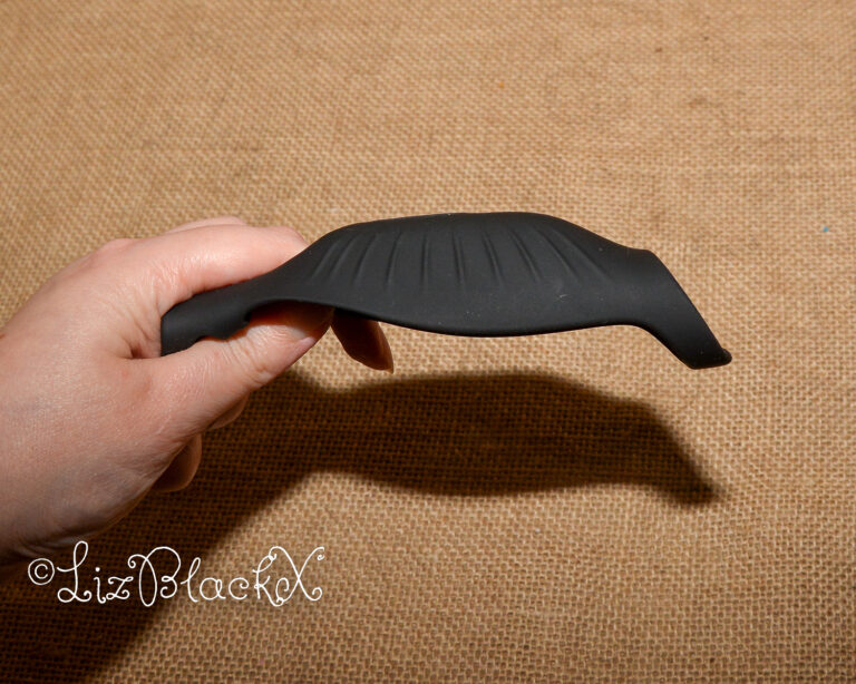 Review of The Rocketeer Vibrating Penis Enhancer Sheath Sponsored by BettysToyBox.com Copyright LizBlackX
