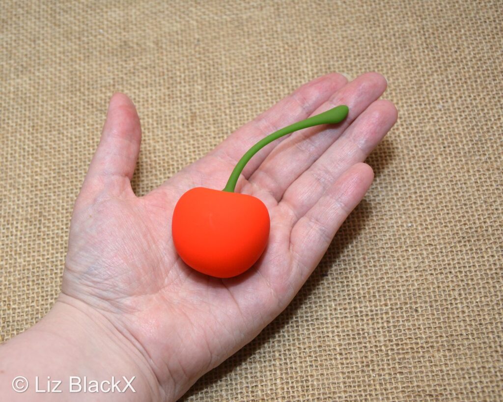 Funzze Cherry Vibrating Love Egg Review: Cute but Powerful? Copyright Liz BlackX